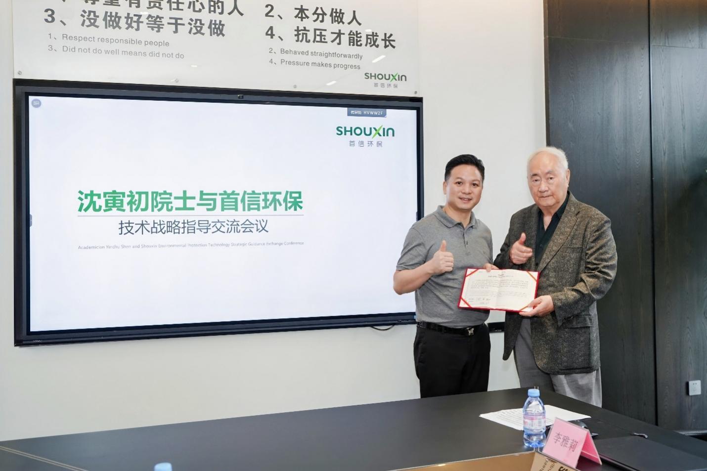 A group of men standing in front of a white board
AI-generated content may be incorrect.